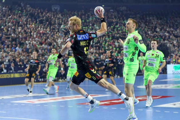 13.06.2026, xgox, Handball - EHF Champions League Halbfinale SC Magdeburg - Füchse Berlin v.l. Matthias Musche (Magdeburg, 6) wirft Tor, Torschuetze, erzielt Tor, Treffer, scores the goal Köln