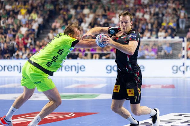 Felix CLAAR (SC Magdeburg, 07) im Zweikampf gegen Max DARJ (Fuechse Berlin, 05) GER, SC Magdeburg vs. Fuechse Berlin, Handball, TruckScout24 EHF FINAL4 2026, Halbfinale, Spielzeit 2025 2026, 13.06.2026, GER, SC Magdeburg vs. Fuechse Berlin, Handball, TruckScout24 EHF FINAL4 2026, Halbfinale, Spielzeit 2025 2026, 13.06.2026, Koeln