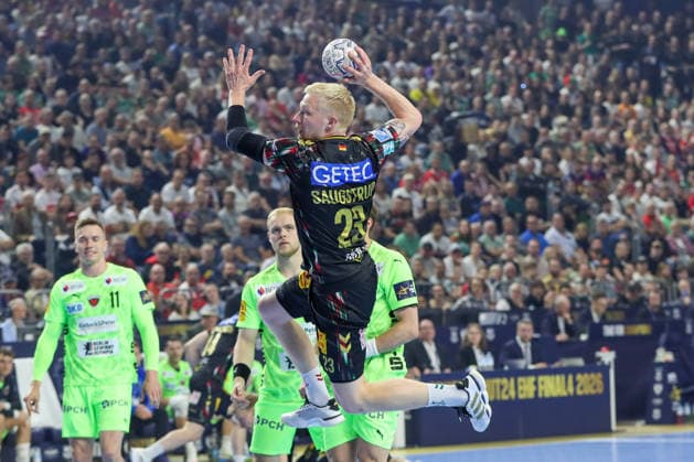 13.06.2026, xgox, Handball - EHF Champions League Halbfinale SC Magdeburg - Füchse Berlin v.l. Magnus Saugstrup (Magdeburg, 23) wirft Tor, Torschuetze, erzielt Tor, Treffer, scores the goal Köln