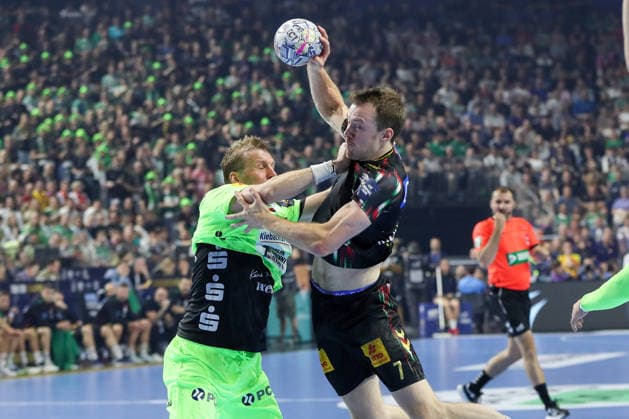 13.06.2026, xgox, Handball - EHF Champions League Halbfinale SC Magdeburg - Füchse Berlin v.l. Max Darj (Berlin, 5), Felix Claar (Magdeburg, 7) Zweikampf, Duell, Kampf, tackle Köln