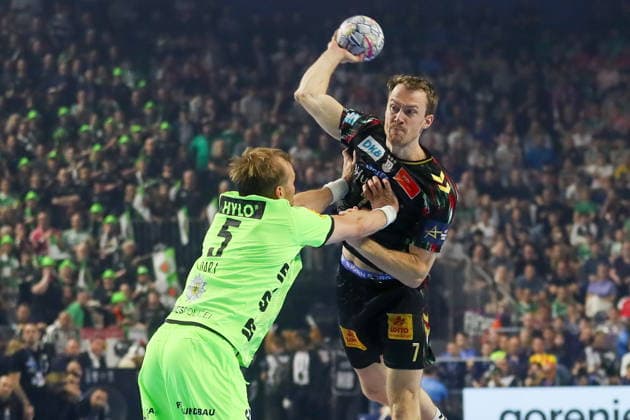 Cologne 13.06.2026. Pilka reczna EHF Liga Mistrzow sezon 2025 26 final4 mecz: SC Magdeburg - Fuchse Berlin --- Handball EHF Champions League season 2025 26 final4 match: SC Magdeburg - Fuchse Berlin nz Claar Felix, Dark Max Fot. Kacper Staniec NEWSPIX.PL --- newspix.pl 