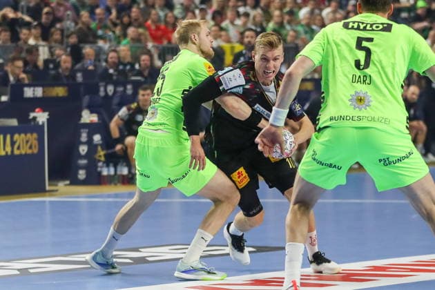 Cologne 13.06.2026. Pilka reczna EHF Liga Mistrzow sezon 2025 26 final4 mecz: SC Magdeburg - Fuchse Berlin --- Handball EHF Champions League season 2025 26 final4 match: SC Magdeburg - Fuchse Berlin nz Kristjansson Gisli, Dark Max Fot. Kacper Staniec NEWSPIX.PL --- newspix.pl 