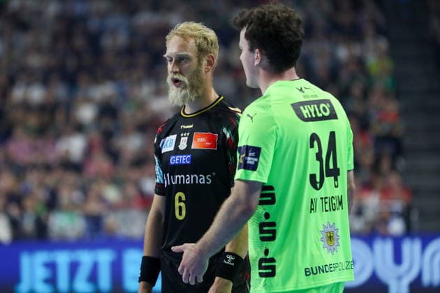 Cologne 13.06.2026. Pilka reczna EHF Liga Mistrzow sezon 2025 26 final4 mecz: SC Magdeburg - Fuchse Berlin --- Handball EHF Champions League season 2025 26 final4 match: SC Magdeburg - Fuchse Berlin nz Musche Matthias, Av Teigum Hakun Fot. Kacper Staniec NEWSPIX.PL --- newspix.pl 