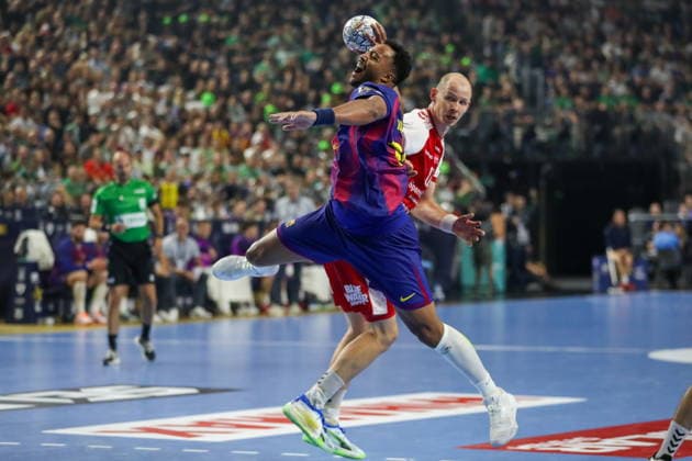 Cologne 13.06.2026. Pilka reczna EHF Liga Mistrzow sezon 2025 26 final4 mecz: Aalborg Handbold - Barca --- Handball EHF Champions League season 2025 26 final4 match: Aalborg Handbold - Barca nz Nguessan Timothey Fot. Kacper Staniec NEWSPIX.PL --- newspix.pl 