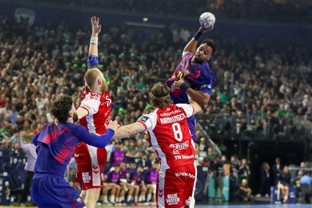 Cologne 13.06.2026. Pilka reczna EHF Liga Mistrzow sezon 2025 26 final4 mecz: Aalborg Handbold - Barca --- Handball EHF Champions League season 2025 26 final4 match: Aalborg Handbold - Barca nz Nguessan Timothey Fot. Kacper Staniec NEWSPIX.PL --- newspix.pl 