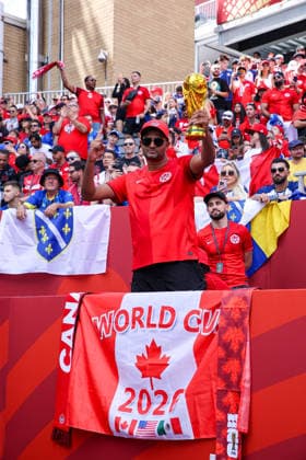 Canada v Bosnia and Herzegovina: Group B - FIFA World Cup, WM, Weltmeisterschaft, Fussball 2026 A Team Canada supporter poses with a replica FIFA World Cup trophy during the FIFA World Cup 2026 group stage match between Canada and Bosnia and Herzegovina at Toronto Stadium in Toronto, Canada, on June 12, 2026. Toronto Ontario Canada  Copyright: xIndrawanxKumalax originalFilename:kumala-thefifaw260612_npaRe.jpg
