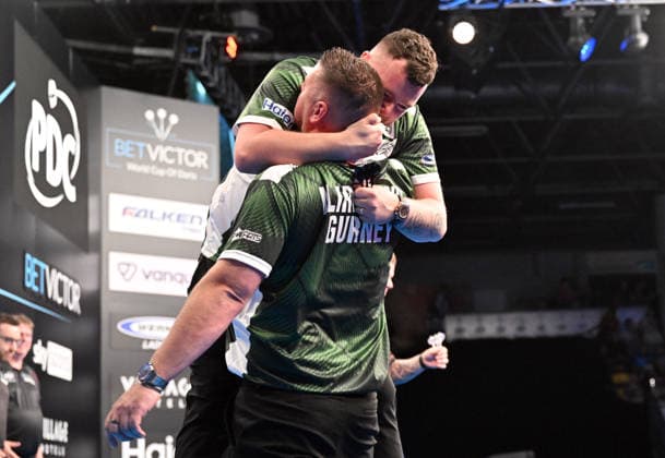 13.06.2026, xhbx, Dart World Cup of Darts 2026, v.l. Daryl Gurney (Nordirland), Josh Rock (Nordirland) jubeln jubelt nach Spielende. (DFL DFB REGULATIONS PROHIBIT ANY USE OF PHOTOGRAPHS as IMAGE SEQUENCES and or QUASI-VIDEO) Frankfurt