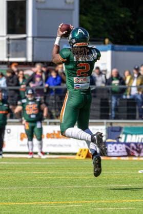 13.06.2026 American Football German Football League 2026 Kiel Baltic Hurricanes - Düsseldorf Panther (Kiel in Grün, Düsseldorf in Weiß) Jarvis McClam Kiel Kilia-Stadion, Hasseldieksdammer Schleswig Holstein Deutschland