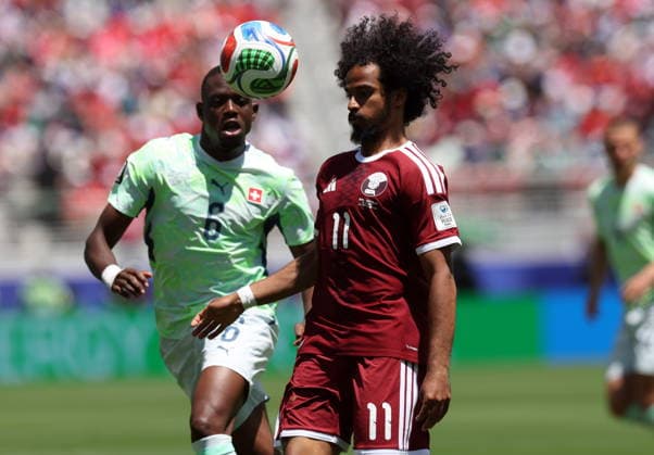 FIFA World Cup, WM, Weltmeisterschaft, Fussball 2026 - Group B - Qatar vs Switzerland Denis Zakaria of Switzerland and Akram Afif of Qatar (R) in action during the FIFA World Cup 2026 group stage match Qatar against Switzerland, in San Francisco, USA, 13 June 2026. SAN FRANCISCO United States  Copyright: xBENJAMINxFANJOYx