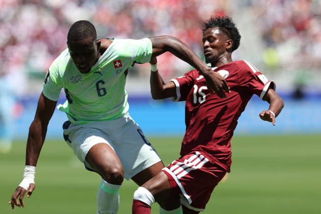 FIFA World Cup, WM, Weltmeisterschaft, Fussball 2026 - Group B - Qatar vs Switzerland Denis Zakaria of Switzerland (L) and Yusuf Abdurisag of Qatar in action during the FIFA World Cup 2026 group stage match Qatar against Switzerland, in San Francisco, USA, 13 June 2026. SAN FRANCISCO United States  Copyright: xBENJAMINxFANJOYx