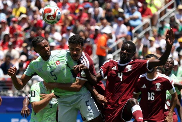 FIFA World Cup, WM, Weltmeisterschaft, Fussball 2026 - Group B - Qatar vs Switzerland (L-R) Manuel Akanji of Switzerland, Ayoub Al-Oui of Qatar, Issa Laye of Qatar in action during the FIFA World Cup 2026 group stage match Qatar against Switzerland, in San Francisco, USA, 13 June 2026. SAN FRANCISCO United States  Copyright: xBENJAMINxFANJOYx