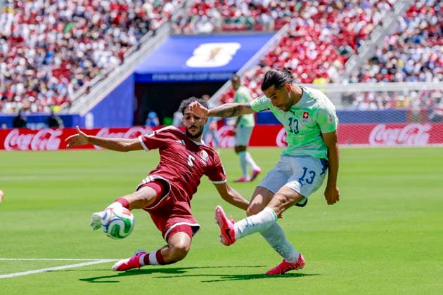 FIFA World Cup, WM, Weltmeisterschaft, Fussball 2026 - Group B - Qatar vs Switzerland Qatar s Jassem Gaber, left, in action against Switzerland s Ricardo Rodriguez, right, during the FIFA World Cup 2026 group stage match Qatar against Switzerland, in San Francisco, USA, 13 June 2026. San Francisco United States  Copyright: xPETERxKLAUNZERx