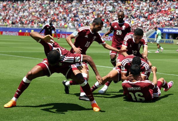 FIFA World Cup, WM, Weltmeisterschaft, Fussball 2026 - Group B - Qatar vs Switzerland Boualem Khoukhi of Qatar (down-R) celebrates scoring the 1-1 with teammates during the FIFA World Cup 2026 group stage match Qatar against Switzerland, in San Francisco, USA, 13 June 2026. SAN FRANCISCO United States  Copyright: xBENJAMINxFANJOYx