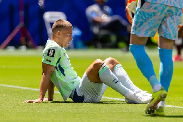 SANTA CLARA, CA - JUNE 13: Miro Muheim 2 of Switzerland sits on the floor after a Qatar goal in the second half of the FIFA World Cup, WM, Weltmeisterschaft, Fussball 2026 Group B match between Qatar and Switzerland on June 13, 2026 at San Francisco Bay Area Stadium in Santa Clara, CA. (Photo by Matthew Huang Icon Sportswire) SOCCER: JUN 13 FIFA World Cup 26 Group B - Qatar vs Switzerland EDITORIAL USE ONLY Icon260613026