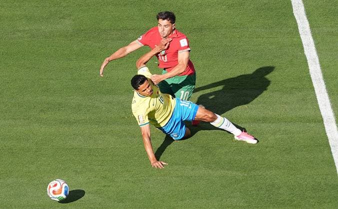 Douglas of Brazil fouls Brahim Diaz of Morocco Brazil v Morocco, 2026 FIFA World Cup, WM, Weltmeisterschaft, Fussball Group C, Football, New York New Jersey Stadium, East Rutherford, New Jersey, USA - 13 Jun 2026East Rutherford New York New Jersey Stadium New Jersey (NJ) United States of America EDITORIAL USE ONLY No use with unauthorised audio, video, data, fixture lists, club league logos or live services. Online in-match use limited to 120 images, no video emulation. No use in betting, games or single club league player publications.  Copyright: xIsmaelxAdnan Shutterstockx 16924266e