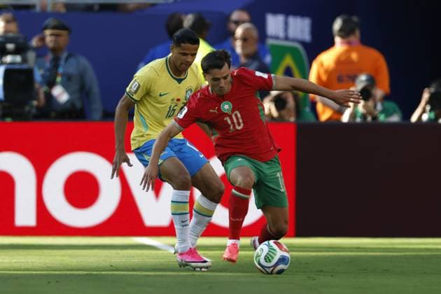NEW JERSEY - Douglas Santos of Brazil and Brahim Diaz of Morocco during the FIFA 2026 World Cup Group C match between Brazil and Morocco at the New Jersey Stadium on June 14, 2026, in New Jersey, United States. MAURICE VAN STEEN ANP FIFA World Cup, WM, Weltmeisterschaft, Fussball 2026 - group C 2026 xVIxANPxSportx xMauricexvanxSteenxIVx 560935773 originalFilename: 560935773.jpg