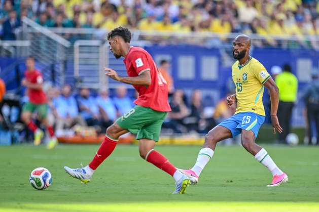 Chadi Riad (Morocco) and Thiago (Brazil) battle for the ball during the FIFA World Cup, WM, Weltmeisterschaft, Fussball 2026 Group C match between Brazil and Morocco at New York New Jersey Stadium on June 13, 2026 in East Rutherford, United States. (Photo by Harry Langer DeFodi Images) -