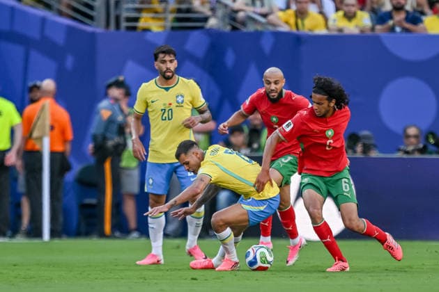 Bruno Guimaraes (Brazil) and Ayyoub Bouaddi (Morocco) battle for the ball during the FIFA World Cup, WM, Weltmeisterschaft, Fussball 2026 Group C match between Brazil and Morocco at New York New Jersey Stadium on June 13, 2026 in East Rutherford, United States. (Photo by Harry Langer DeFodi Images) -