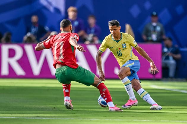 Ismael Saibari (Morocco) and Douglas Santos (Brazil) battle for the ball during the FIFA World Cup, WM, Weltmeisterschaft, Fussball 2026 Group C match between Brazil and Morocco at New York New Jersey Stadium on June 13, 2026 in East Rutherford, United States. (Photo by Harry Langer DeFodi Images) -