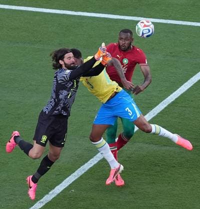 Alisson Becker of Brazil punches clear Brazil v Morocco, 2026 FIFA World Cup, WM, Weltmeisterschaft, Fussball Group C, Football, New York New Jersey Stadium, East Rutherford, New Jersey, USA - 13 Jun 2026East Rutherford New York New Jersey Stadium New Jersey (NJ) United States of America EDITORIAL USE ONLY No use with unauthorised audio, video, data, fixture lists, club league logos or live services. Online in-match use limited to 120 images, no video emulation. No use in betting, games or single club league player publications.  Copyright: xIsmaelxAdnan Shutterstockx 16924266u