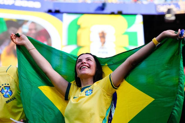 June 14, 2026, East Rutherford, New Jersey, United States: Supporter of Brazil poses for the photo with the flag of Brazil during the FIFA World Cup, WM, Weltmeisterschaft, Fussball 2026 Group C match between Brazil and Morocco at New York New Jersey Stadium on June 13, 2026 in East Rutherford, New Jersey. Brazil V Morocco: Group C - FIFA World Cup 2026  - ZUMAa181 20260614_zaa_a181_001 Copyright: xJosexBretonx
