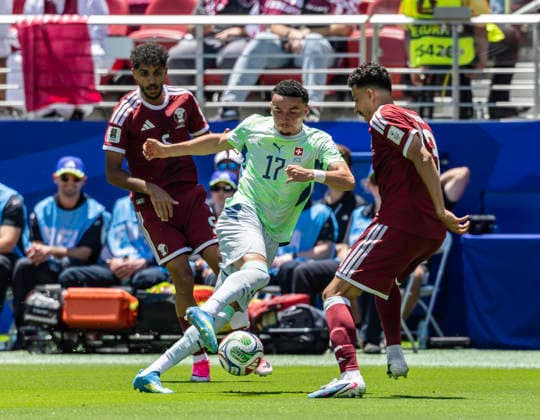 June 13 2026 Switzerland midfielder Ruben Vargas (17) tries to keep the ball away from Qatar defenders Ayoub al-Oui(13) and defender Jassem Gaber (5) during the FIFA World Cup, WM, Weltmeisterschaft, Fussball game between Qatar and Switzerland. CSM World Cup 2026: Qatar Vs Switzerland JUN 13  - ZUMAc04_ 20260613_zma_c04_120 Copyright: xThurmanxJamesx