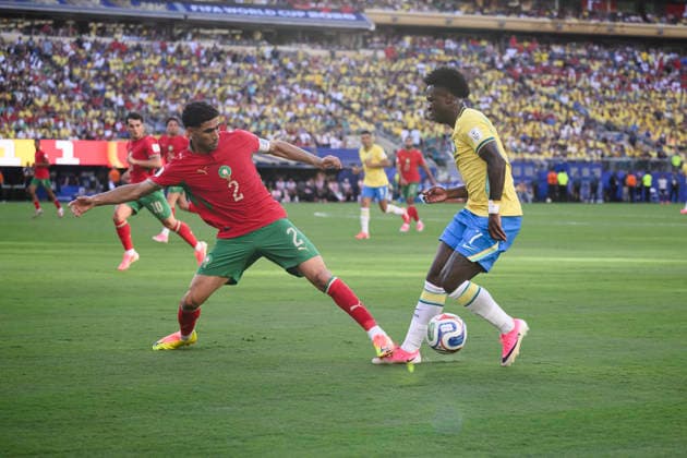 Brazil v Morocco - FIFA World Cup, WM, Weltmeisterschaft, Fussball 2026 Vinicius Junior of Brazil competes for the ball with Achraf Hakimi of Morocco during the FIFA World Cup 2026 Group C football match between Brazil and Morocco. East Rutherford United States Copyright: xNicolòxCampox