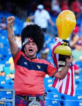 Scotland fans in the stands with inflatable World Cup trophies Haiti v Scotland, 2026 FIFA World Cup, WM, Weltmeisterschaft, Fussball Group C, Football, Boston Stadium, Foxborough, Massachusetts, USA - 13 Jun 2026Foxborough Boston Stadium Massachusetts (MA) United States of America EDITORIAL USE ONLY No use with unauthorised audio, video, data, fixture lists, club league logos or live services. Online in-match use limited to 120 images, no video emulation. No use in betting, games or single club league player publications.  Copyright: xJavierxGarcia Shutterstockx 16924166u