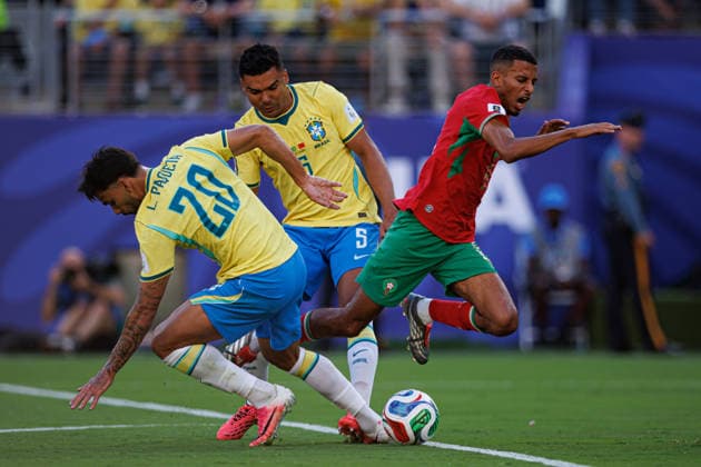 Lucas Paqueta and Azzedine Ounahi seen during FIFA World Cup, WM, Weltmeisterschaft, Fussball 2026 game between national teams of Brazil and Morocco (Grzegorz Wajda Ball Raw Images) New Jersey MetLife Stadium USA Copyright: xGrzegorzxWajdax grzegorzwajda_brazil_morocco_2526_3-17