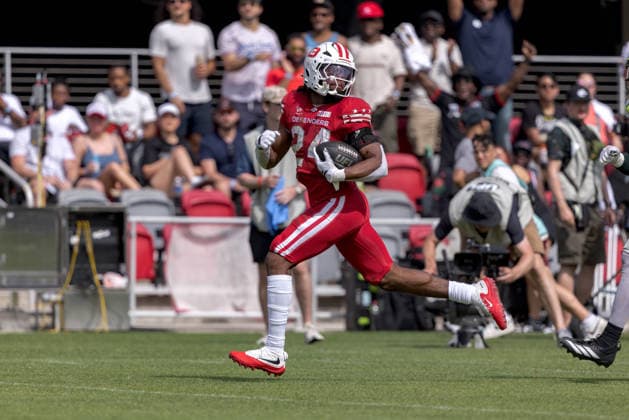 June 13, 2026, Washington, D.C, U.S: DC Defenders running back Xazavian Valladay (24) looks back as he scores a touchdown during the United Bowl UFL Championship game at Audi Field, Washington, D.C. UFL 2026 - United Bowl -Kings 27:20 Defenders  - ZUMAs304 20260613_zaf_s304_021 Copyright: xScottxStuartx