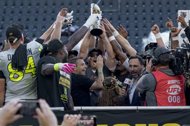 June 13, 2026, Washington, D.C, U.S: Louisville Kings head coach Chis Redmond (center) holds up the trophy for winning the United Bowl UFL Championship game at Audi Field, Washington, D.C. UFL 2026 - United Bowl -Kings 27:20 Defenders  - ZUMAs304 20260613_zaf_s304_029 Copyright: xScottxStuartx
