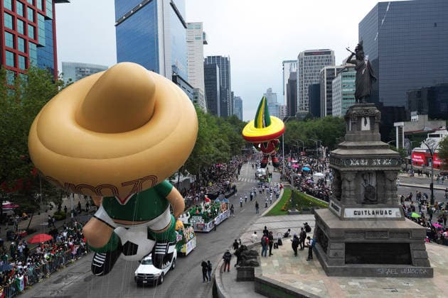 World Cup parade held in Mexico City MEXICO CITY, MEXICO - JUNE 13: A giant football themed inflatable figure moves along the route during a World Cup parade, in Mexico City, Mexico on June 13, 2026. Thousands of participants, including dancers, football-themed floats and giant inflatable figures, took part in the World Cup parade as part of the cultural activities organized by the Mexico City government during the World Cup. Daniel Cardenas Anadolu Mexico City Mexico. Editorial use only. Please get in touch for any other usage.  Copyright: x2026xAnadoluxDanielxCardenasx