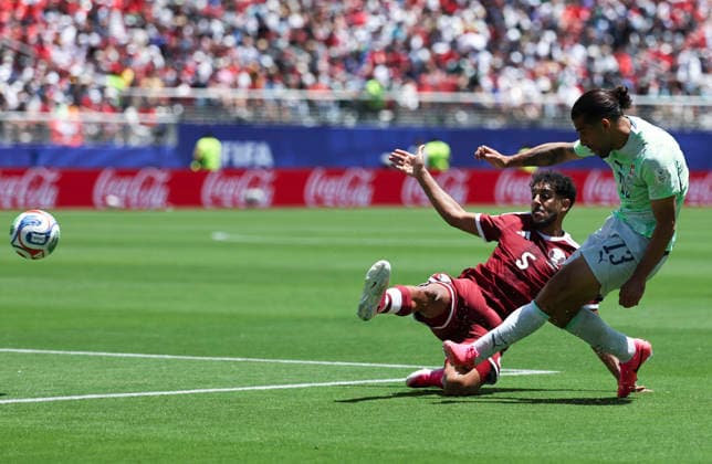(260614) -- SAN FRANCISCO, June 14, 2026 -- Ricardo Rodriguez (R) of Switzerland vies with Jassem Gaber of Qatar during the group B match between Qatar and Switzerland at the 2026 FIFA World Cup, WM, Weltmeisterschaft, Fussball at San Francisco Bay Area Stadium in San Francisco, the United States, June 13, 2026. (Photo by Xinhua) (SP)U.S.-SAN FRANCISCO-FOOTBALL-FIFA WORLD CUP-GROUP B-QAT VS SUI SongxHaiyuan 