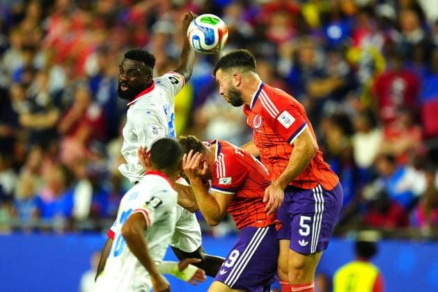 Frantzdy Pierrot of Haiti battles against Grant Hanley of Scotland for a header Haiti v Scotland, 2026 FIFA World Cup, WM, Weltmeisterschaft, Fussball Group C, Football, Boston Stadium, Foxborough, Massachusetts, USA - 13 Jun 2026Foxborough Boston Stadium Massachusetts (MA) United States of America EDITORIAL USE ONLY No use with unauthorised audio, video, data, fixture lists, club league logos or live services. Online in-match use limited to 120 images, no video emulation. No use in betting, games or single club league player publications.  Copyright: xJavierxGarcia Shutterstockx 16924166bv