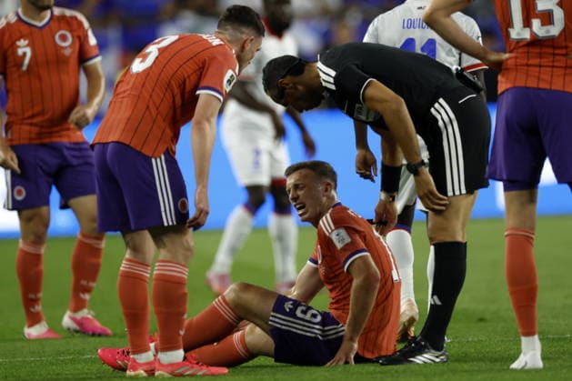FIFA World Cup, WM, Weltmeisterschaft, Fussball 2026 - Group C - Haiti vs Scotland Referee Mustapha Ghorbal checks on Duckens Nazon of Haiti (on the ground) during the FIFA World Cup 2026 group stage match Haiti against Scotland, in Foxborough, Massachusetts, USA, 13 June 2026. BOSTON United States  Copyright: xGREGxM.xCOOPERx