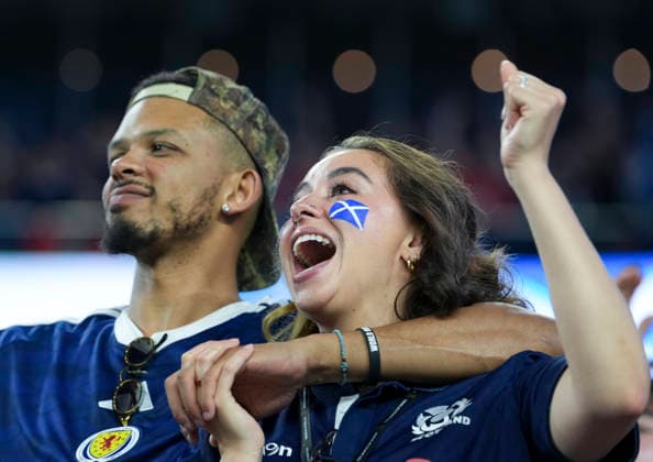 (260614) -- BOSTON, June 14, 2026 -- Fans of Scotland cheer before the group C match between Haiti and Scotland at the 2026 FIFA World Cup, WM, Weltmeisterschaft, Fussball at Boston Stadium in Boston, the United States, June 13, 2026. ) (SP)U.S.-BOSTON-FOOTBALL-FIFA WORLD CUP-GROUP C-HTI VS SCO ChenxYichen 