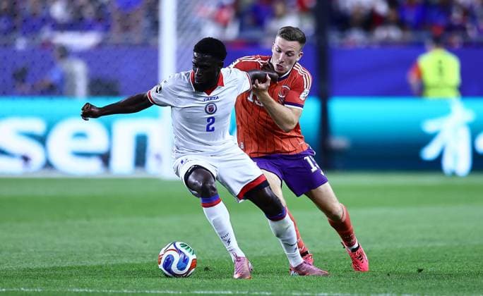 Carlens Arcus of Haiti and Lewis Ferguson of Scotland in action Haiti v Scotland, 2026 FIFA World Cup, WM, Weltmeisterschaft, Fussball Group C, Football, Boston Stadium, Foxborough, Massachusetts, USA - 13 Jun 2026Foxborough Boston Stadium Massachusetts (MA) United States of America EDITORIAL USE ONLY No use with unauthorised audio, video, data, fixture lists, club league logos or live services. Online in-match use limited to 120 images, no video emulation. No use in betting, games or single club league player publications.  Copyright: xMichaelxZemanek Shutterstockx 16924167bb