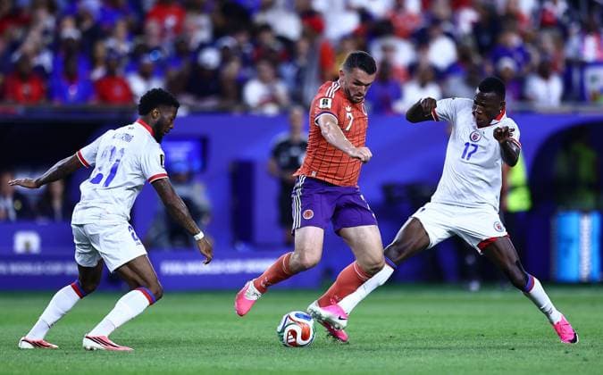 John McGinn of Scotland and Danley Jean Jacques of Haiti in action Brazil v Morocco, 2026 FIFA World Cup, WM, Weltmeisterschaft, Fussball Group C, Football, New York New Jersey Stadium, East Rutherford, New Jersey, USA - 13 Jun 2026East Rutherford New York New Jersey Stadium New Jersey (NJ) United States of America EDITORIAL USE ONLY No use with unauthorised audio, video, data, fixture lists, club league logos or live services. Online in-match use limited to 120 images, no video emulation. No use in betting, games or single club league player publications.  Copyright: xIsmaelxAdnan Shutterstockx 16924266ao