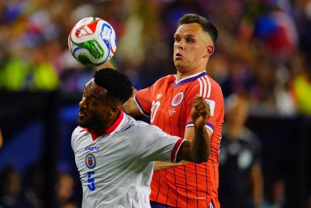Hannes Delcroix of Haiti and Lawrence Shankland of Scotland in action Haiti v Scotland, 2026 FIFA World Cup, WM, Weltmeisterschaft, Fussball Group C, Football, Boston Stadium, Foxborough, Massachusetts, USA - 13 Jun 2026Foxborough Boston Stadium Massachusetts (MA) United States of America EDITORIAL USE ONLY No use with unauthorised audio, video, data, fixture lists, club league logos or live services. Online in-match use limited to 120 images, no video emulation. No use in betting, games or single club league player publications.  Copyright: xJavierxGarcia Shutterstockx 16924166ci