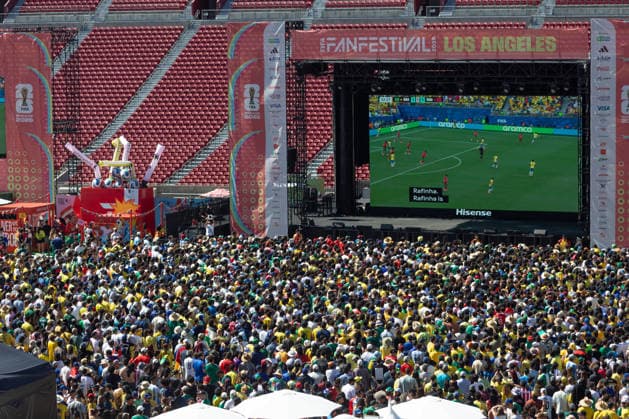Fans watch Brazil v Morocco - FIFA World Cup, WM, Weltmeisterschaft, Fussball 2026 match in Los Angeles LOS ANGELES, CALIFORNIA - JUNE 13: Supporters watch a live broadcast of FIFA World Cup First Stage Group C opening match between Brazil and Morocco during the Fan Festival at the Los Angeles Memorial Coliseum in Los Angeles, California on June 13, 2026. Grace Hie Yoon Anadolu California United States. Editorial use only. Please get in touch for any other usage.  Copyright: x2026xAnadoluxGracexHiexYoonx