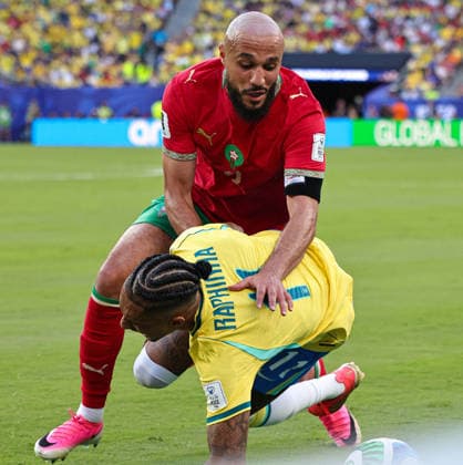 June 13, 2026, Rutherford, New Jersey, USA: Morocco defender Noussair Mazraoui (3) and Brazil forward Raphinha (11) collide during the June 13th FIFA World Cup, WM, Weltmeisterschaft, Fussball 2026 matchup between Morocco and Brazil at MetLife Stadium in East Rutherford, New Jersey. Rutherford USA - ZUMAs325 20260613_zsp_s325_094 Copyright: xJessxStilesx