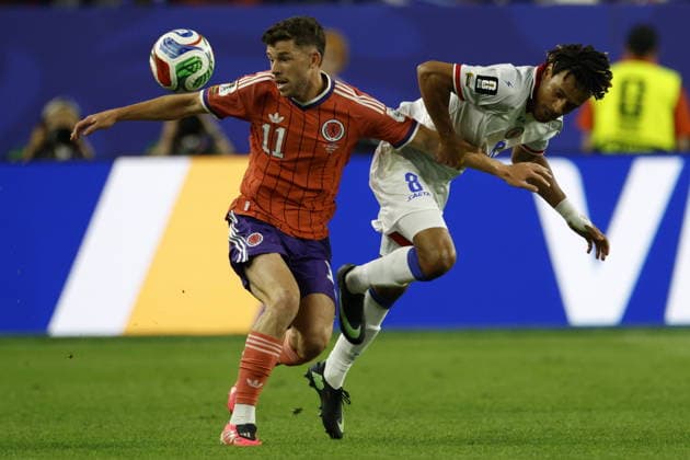 FIFA World Cup, WM, Weltmeisterschaft, Fussball 2026 - Group C - Haiti vs Scotland Ryan Christie of Scotland (L) in action against Martin Experience of Haiti (R) during the FIFA World Cup 2026 group stage match Scotland against Haiti, in East Rutherford, New Jersey, USA, 13 June 2026. BOSTON United States  Copyright: xGREGxM.xCOOPERx