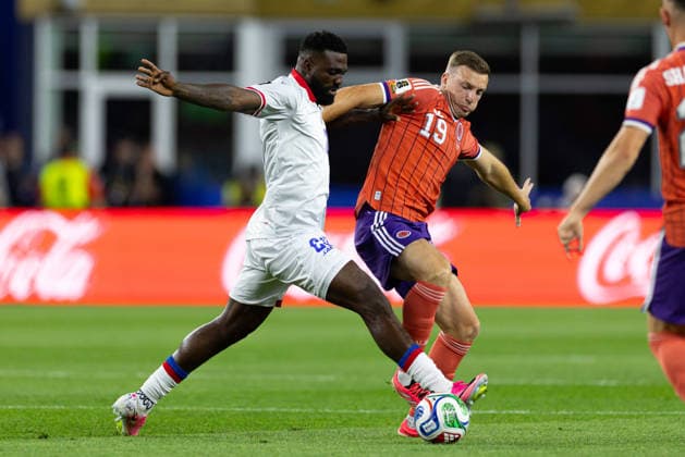 June 13, 2026; Foxborough, Massachusetts, USA; Haiti forward Frantzdy Pierrot (20) gets to the ball ahead of Scotland midfielder Lewis Ferguson (19) in a FIFA World Cup, WM, Weltmeisterschaft, Fussball 2026 Group C match between Haiti and Scotland at Boston Stadium. (c) CSM - ZUMAc04_ 20260613_zma_c04_149 Copyright: xBurtxGranofskyx