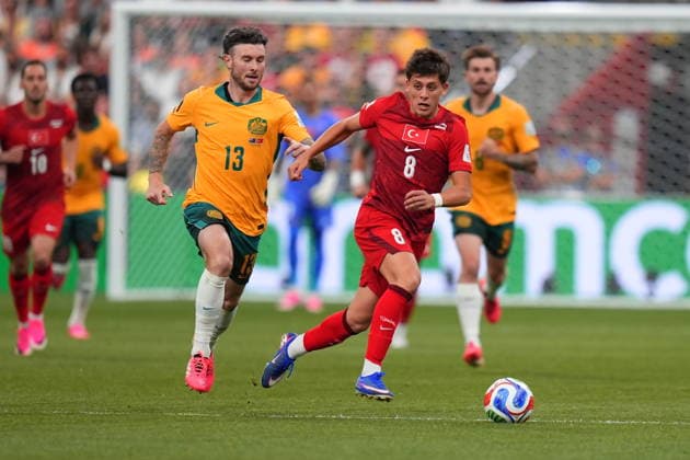 Australia v Turkiye - FIFA World Cup, WM, Weltmeisterschaft, Fussball 2026 - Group D VANCOUVER, CANADA - JUNE 13: Arda Guler (8) of Turkiye in action against Aiden O’Neill (13) of Australia during the 2026 FIFA World Cup First Stage Group D match between Australia and Turkiye at BC Place Stadium in Vancouver, Canada on June 13, 2026. Ercin Erturk Anadolu British Columbia Canada. Editorial use only. Please get in touch for any other usage.  Copyright: x2026xAnadoluxErcinxErturkx