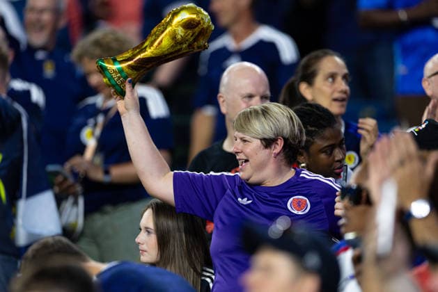 June 13, 2026; Foxborough, Massachusetts, USA; A Scotland fan cheers with a plastic World Cup trophy ahead of a FIFA World Cup, WM, Weltmeisterschaft, Fussball 2026 Group C match between Haiti and Scotland at Boston Stadium. (c) CSM FIFA World Cup 2026: Haiti Vs Scotland JUN 13  - ZUMAc04_ 20260613_zma_c04_265 Copyright: xBurtxGranofskyx