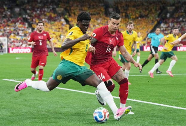 June 13, 2026, Vancouver, Bc, CANADA: Australia s Mohamed Toure (9) and Turkey s Abdulkerim BardakcÄÂ± (14) vie for the ball during the first half of a World Cup Group D soccer match, in Vancouver, on Saturday, June 13, 2026. Canada News - June 13, 2026  - ZUMAc35_ 20260613_zaf_c35_191 Copyright: xDarrylxDyckx