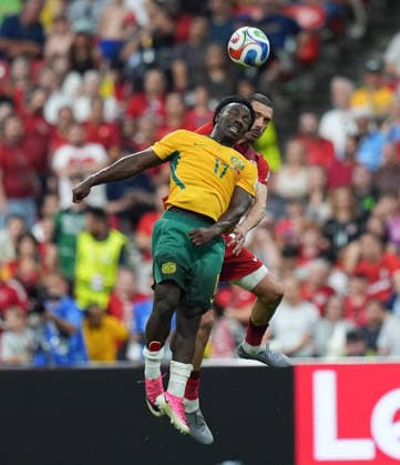 Australia v Turkiye - FIFA World Cup, WM, Weltmeisterschaft, Fussball 2026 - Group D VANCOUVER, CANADA - JUNE 13: Merih Demiral (rear) of Turkiye in action against Nestory Irankunda (2nd L) of Australia during the 2026 FIFA World Cup First Stage Group D match between Australia and Turkiye at BC Place Stadium in Vancouver, Canada on June 13, 2026. Ercin Erturk Anadolu British Columbia Canada. Editorial use only. Please get in touch for any other usage.  Copyright: x2026xAnadoluxErcinxErturkx