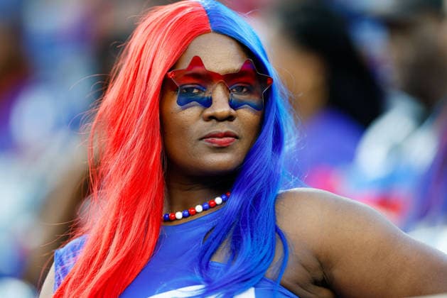 June 13, 2026; Foxborough, Massachusetts, USA; A Haiti fan displays her colors in a FIFA World Cup, WM, Weltmeisterschaft, Fussball 2026 Group C match between Haiti and Scotland at Boston Stadium. (c) CSM - ZUMAc04_ 20260613_zma_c04_249 Copyright: xBurtxGranofskyx