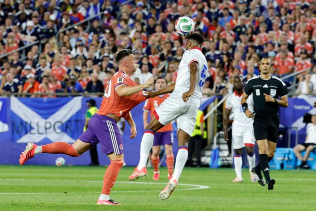 FOXBOROUGH, MA - JUNE 13: Hannes Delcroix 5 of Haiti heads the ball from Lawrence Shankland 20 of Scotland during a FIFA World Cup, WM, Weltmeisterschaft, Fussball 2026 Group C match between the Haiti and Scotland on June 13, 2026 at Boston Stadium in Foxborough, Massachusetts. (Photo by Fred Kfoury III Icon Sportswire) SOCCER: JUN 13 FIFA World Cup 26 Group C - Haiti vs Scotland EDITORIAL USE ONLY Icon482260613018