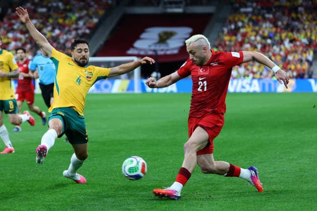 Baris Yilmaz of Turkiye is tackled by Jacob Italiano of Australia during the FIFA World Cup, WM, Weltmeisterschaft, Fussball 2026 match between Australia and Turkey at BC Place, Vancouver, Canada on 13 June 2026. Copyright: xPeterxDovganx 45060026